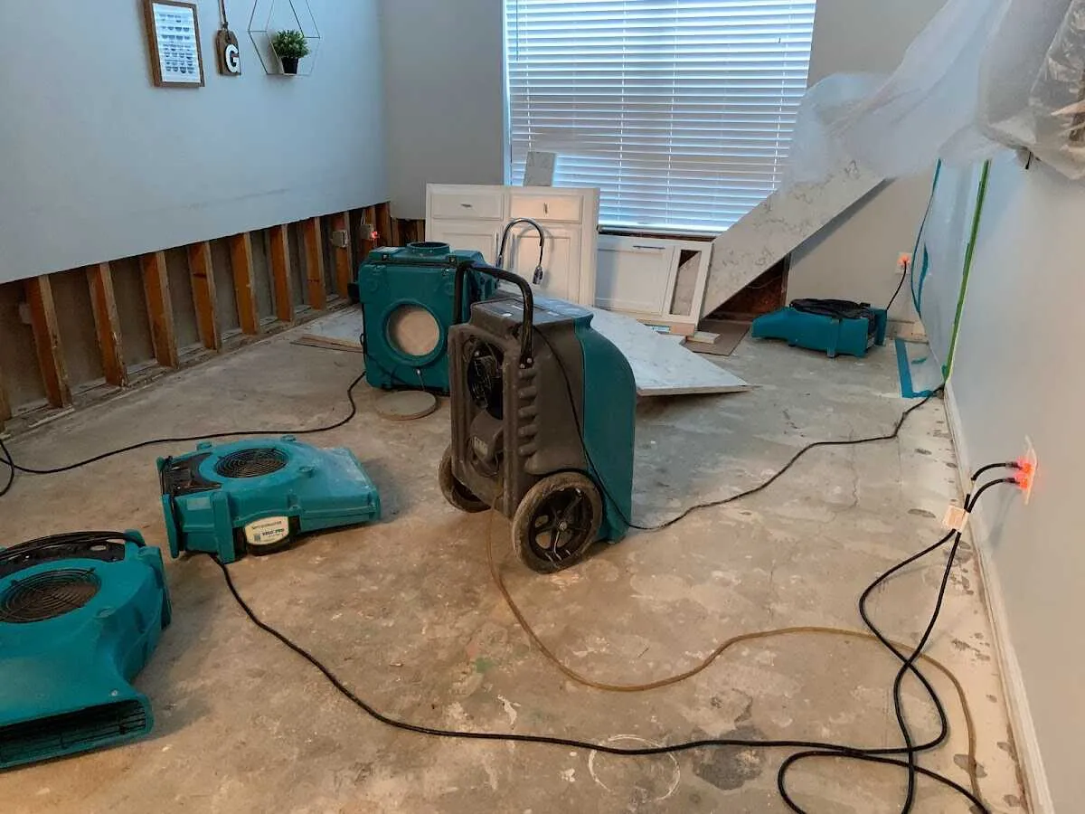 Dehumidifier in flood-cut room for Water Damage Restoration in Jamestown